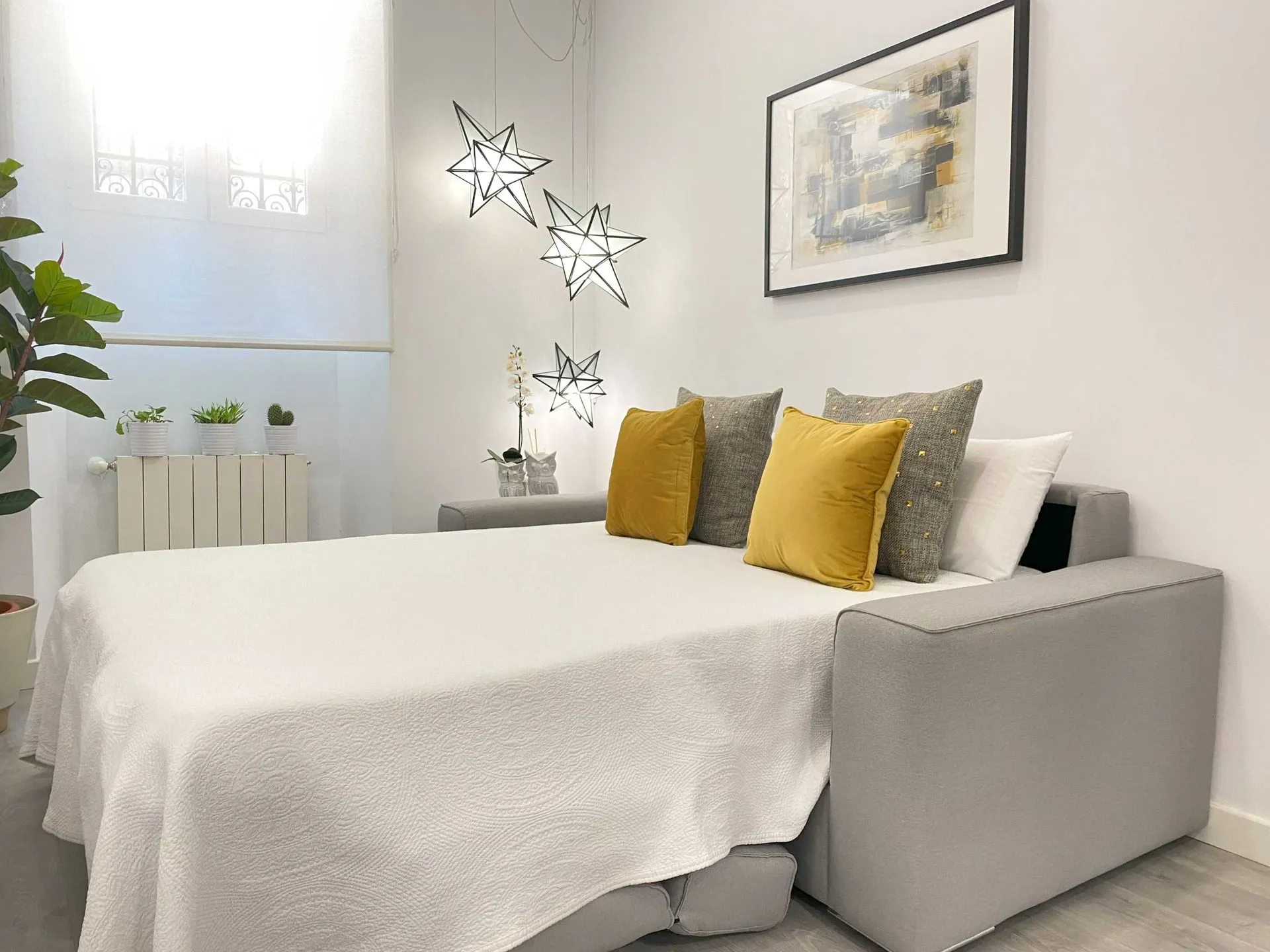Detalle Salón con sofá cama